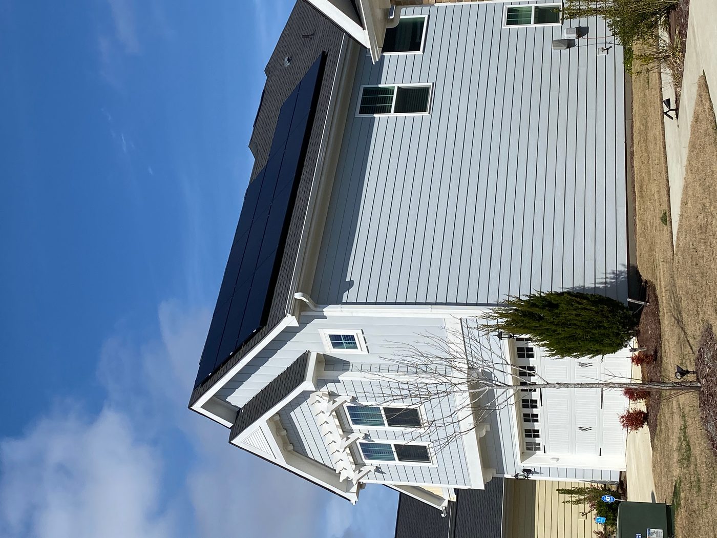 Residential all-black solar panel installation on a two-story home near Raleigh NC
