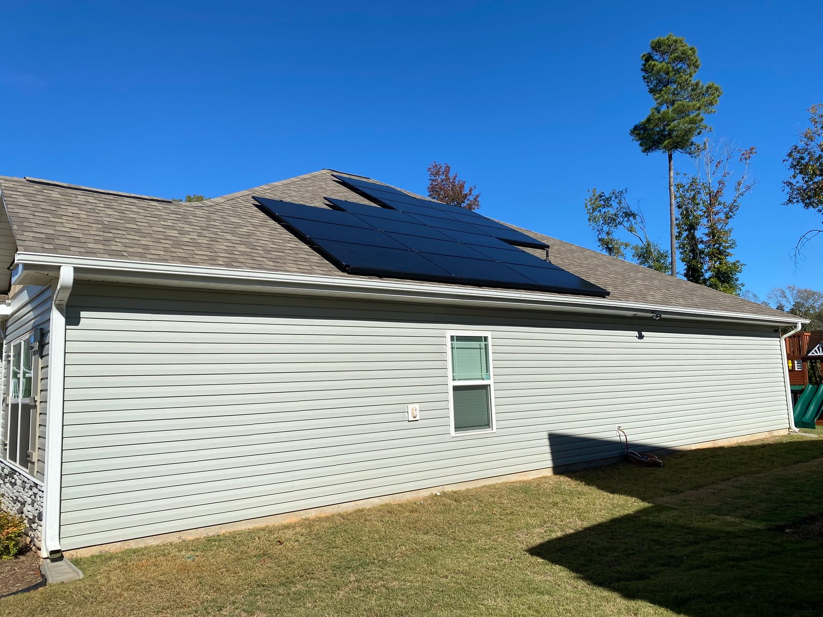 Clean all-black solar panel installation on a single-story home in the Raleigh Triangle NC